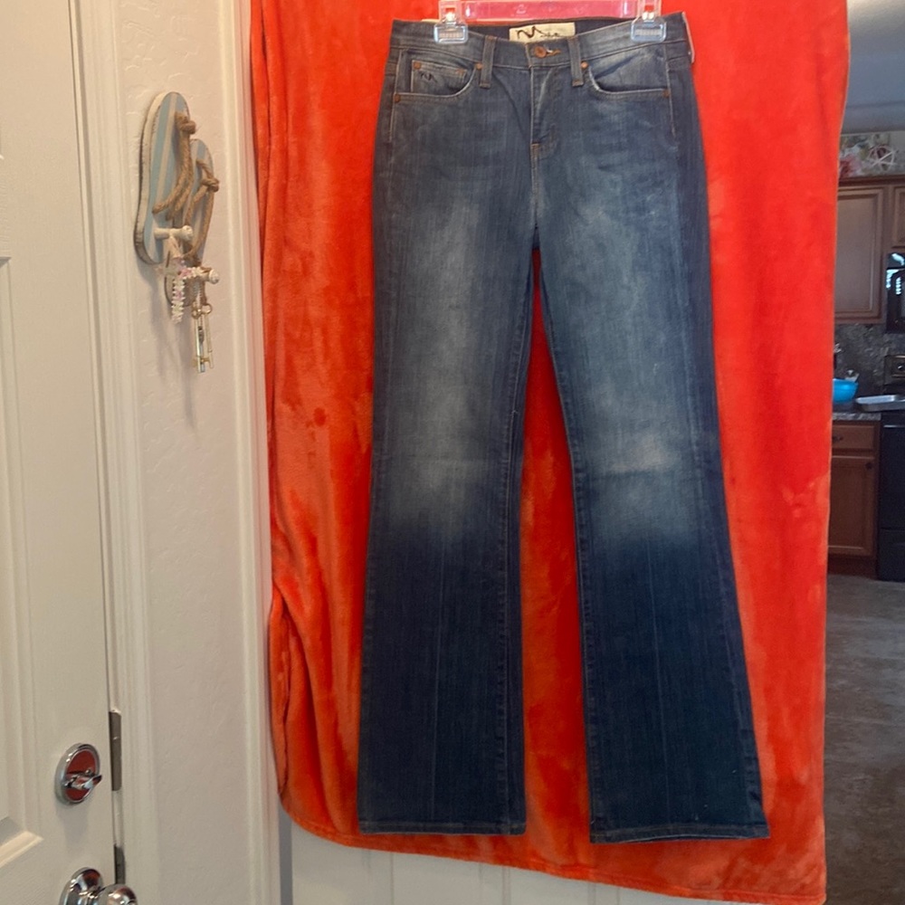 Manhattan Blues brand denim jeans in a size 4